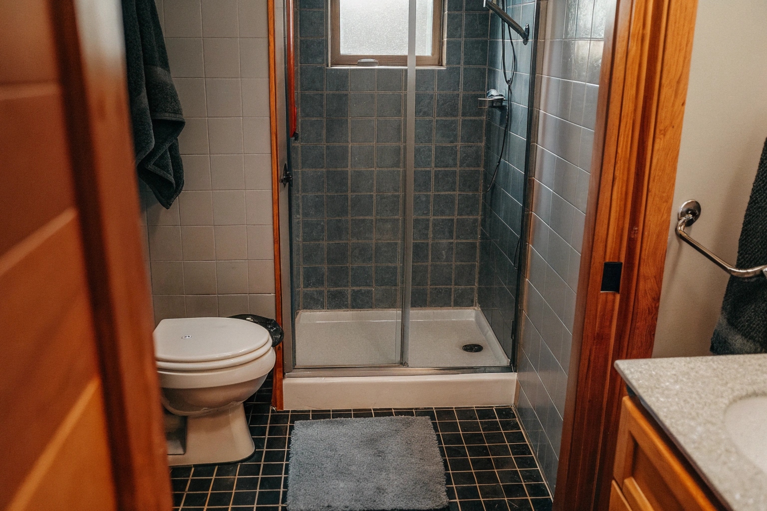 Bathroom after heavy duty cleaning with sanitized tiles, grout, and fixtures in a Toronto home