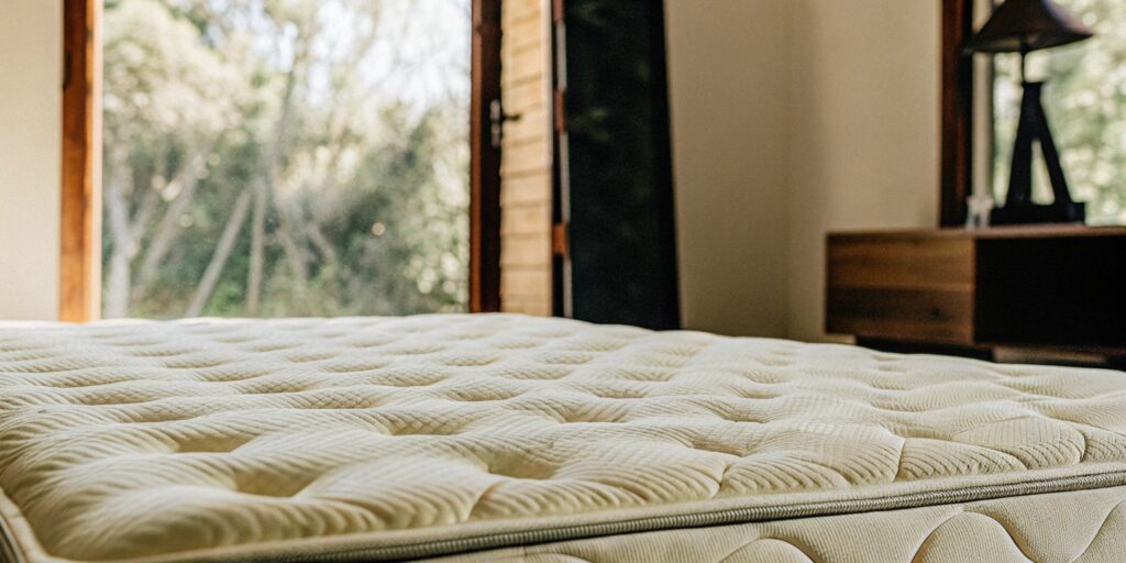 Well-maintained mattress in a calm bedroom after proper cleaning