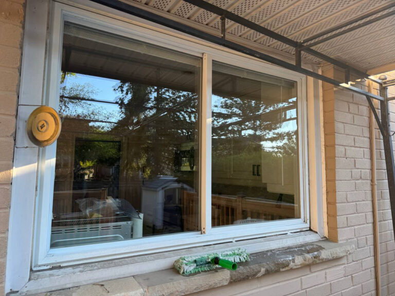 Cleaned exterior sliding window on brick house in East York — Zenvy window cleaning service